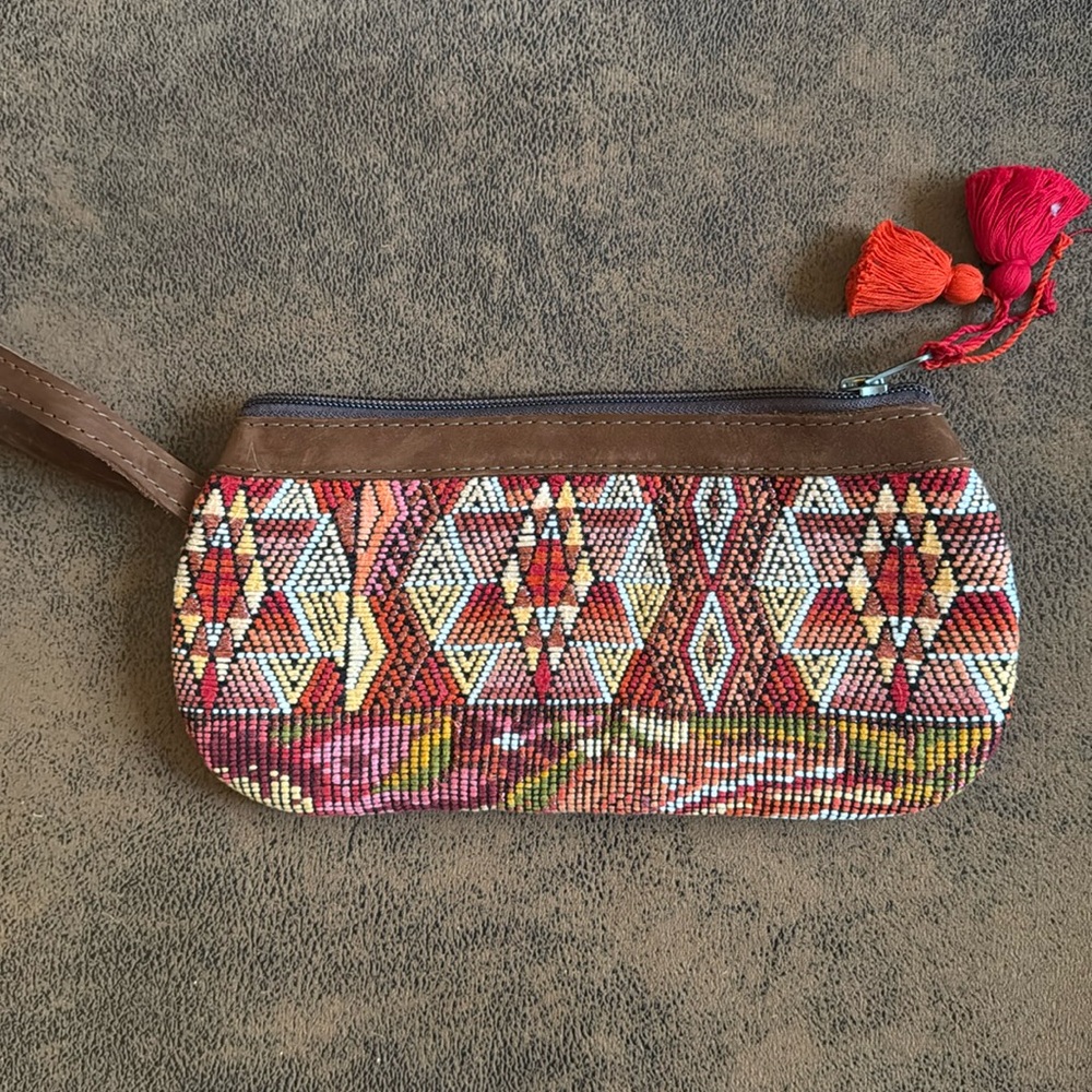 Nena& Co red multi clutch.
Never used.